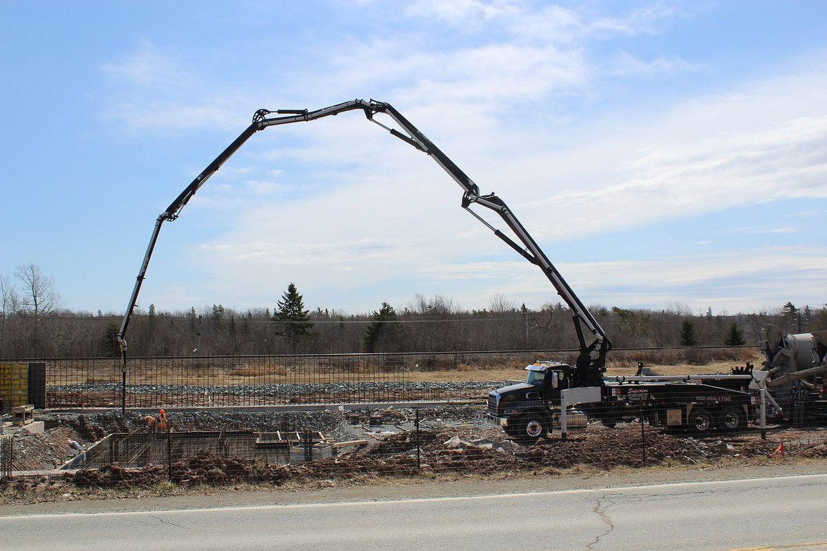 A concrete pump truck on a pour